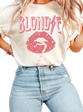 Person wearing a t-shirt with 'Blonde' graphic design on a plain background