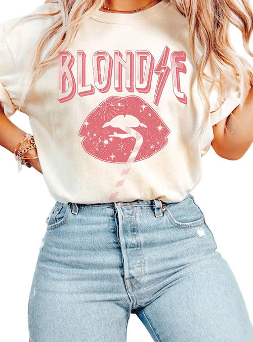 Person wearing a t-shirt with 'Blonde' graphic design on a plain background