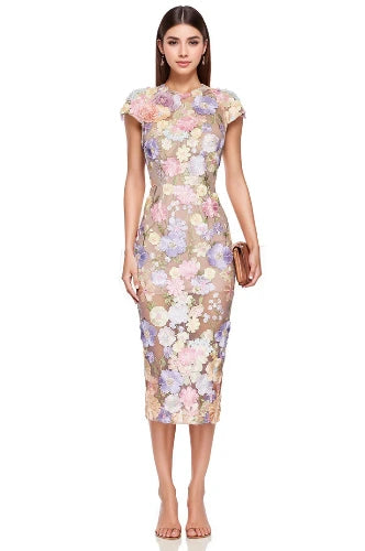 Woman wearing a floral dress on a white background