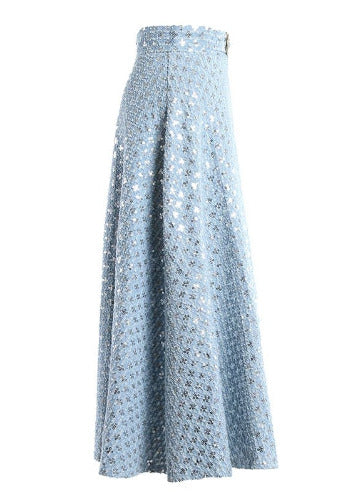 Light blue denim skirt on a white background
